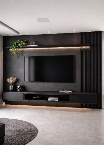 Dark media wall with LED shelf